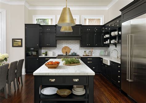 black granite white cabinets gold stainless steel appliances|black and white cabinets.